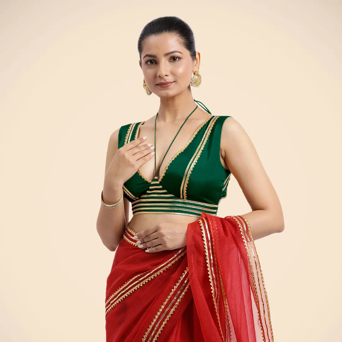 Ahana x Tyohaar | Bottle Green Sleeveless FlexiFit™ Saree Blouse with Plunging Neckline and Back Cut Out with Tasteful Golden Gota Lace Embellishment