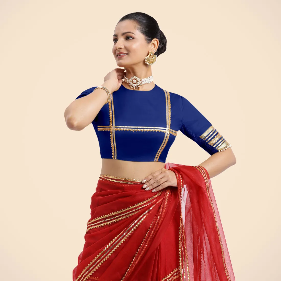 Farheen x Tyohaar | Cobalt Blue Embellished Elbow Sleeves FlexiFit™ Saree Blouse with Zero Neck with Back Cut-Out and Golden Gota Embellishment