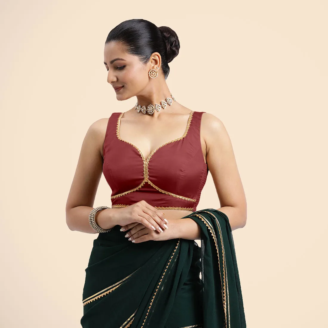 Ishika x Tyohaar | Auburn Red Sleeveless FlexiFit™ Saree Blouse with Beetle Leaf Neckline with Golden Gota Lace and Back Cut-out with Tie-Up