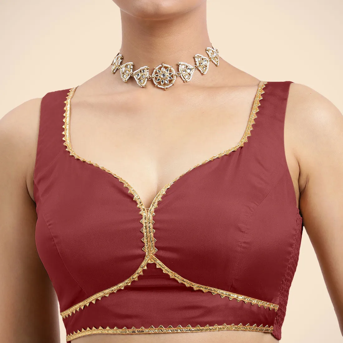 Ishika x Tyohaar | Auburn Red Sleeveless FlexiFit™ Saree Blouse with Beetle Leaf Neckline with Golden Gota Lace and Back Cut-out with Tie-Up