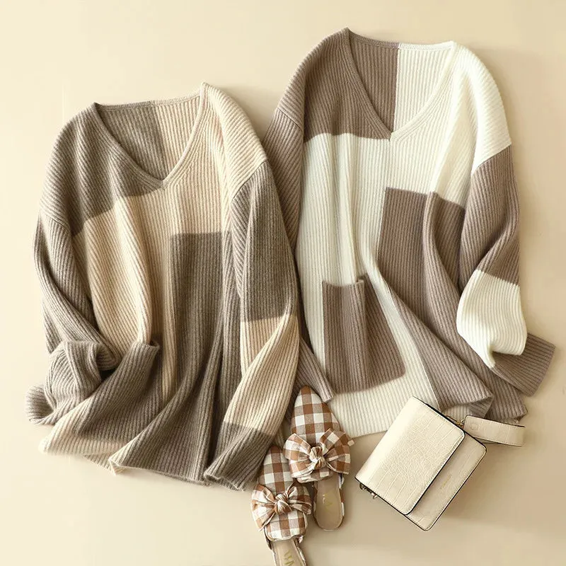 Patchwork Cashmere Sweater This Vneck beauty is the wrapped up in 100 luxurious cashmere winter