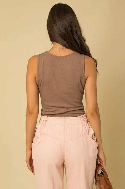 SLEEVELESS CROSS DETAIL BODYSUIT